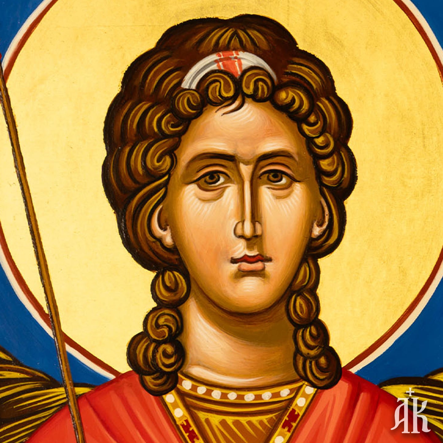 Close-up detail of Archangel Michael face in Byzantine icon, showing strong expression and refined traditional iconography