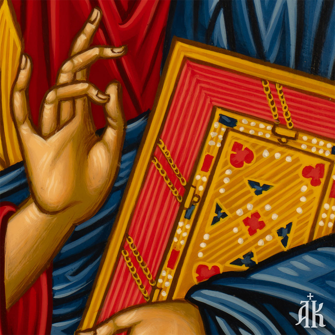 Close detail of hand gesture and decorative elements in Jesus Christ Pantocrator Byzantine icon, highlighting traditional egg tempera technique
