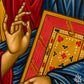 Close detail of hand gesture and decorative elements in Jesus Christ Pantocrator Byzantine icon, highlighting traditional egg tempera technique
