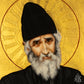 Close-up detail of Saint Paisios face in Byzantine icon, showing gentle expression and spiritual depth