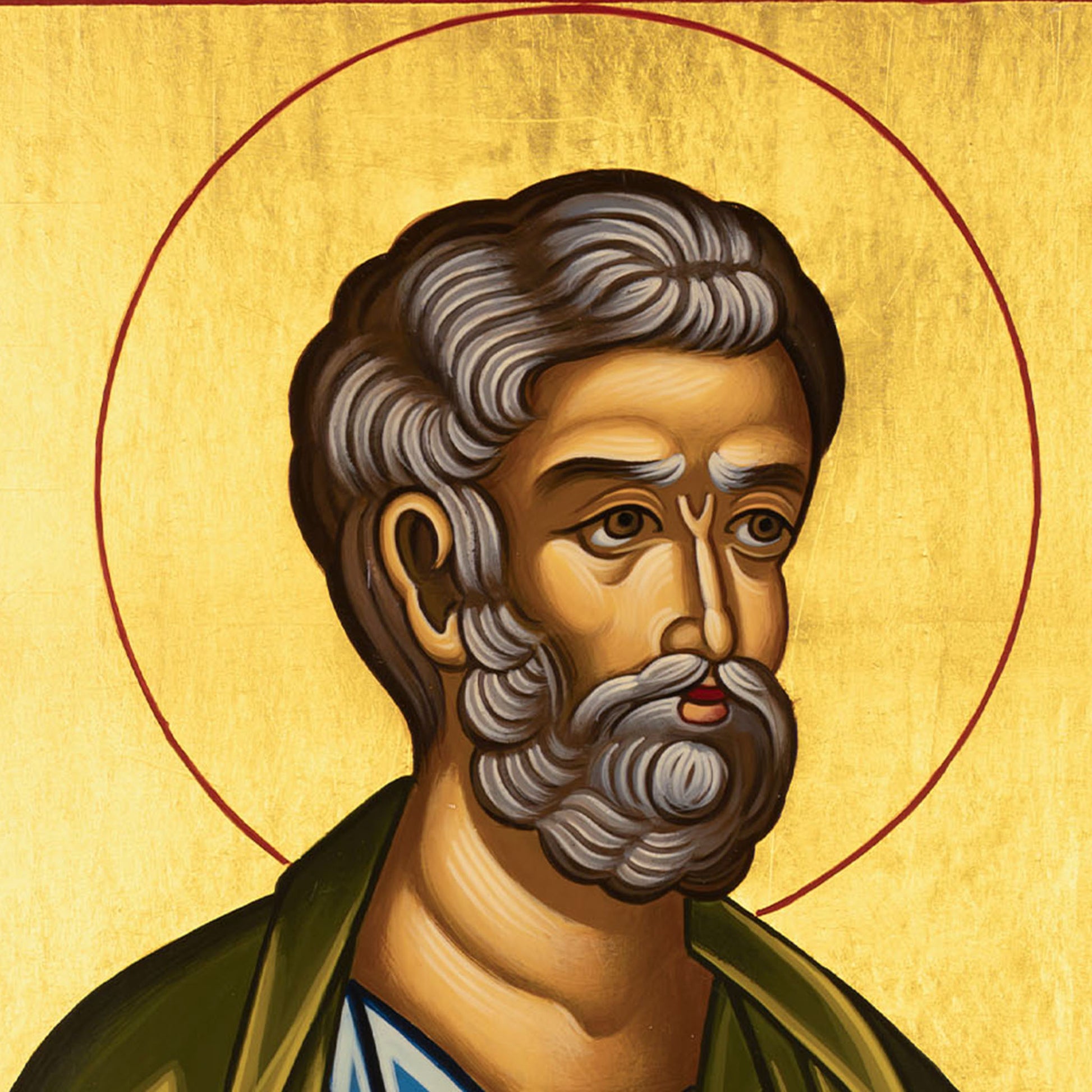 Close-up detail of Saint Peter the Apostle face in Byzantine icon, showing strong expression and spiritual authority