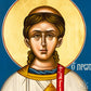 Close-up detail of Saint Stephen the Protomartyr face in Byzantine icon, showing youthful expression and spiritual devotion
